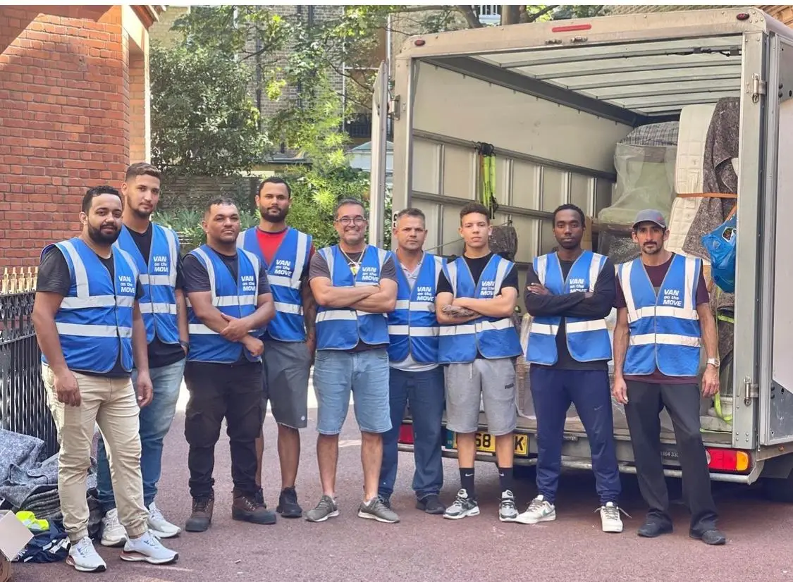 The VAN on the MOVE crew in hi-vis vests in front of their Luton removal van